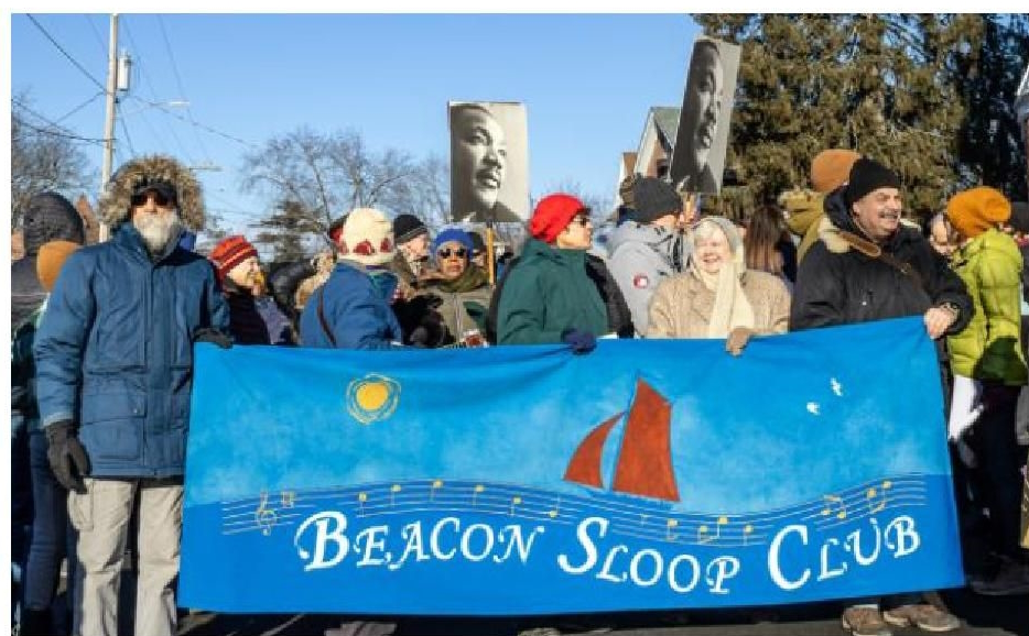image sloop club members marching